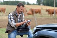 Survey finds farmers pulling back on spending as margins tighten