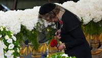 Queen Sonja's final red rose for King Harald leaves Oslo Cathedral in tears
