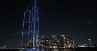 2,977 LIGHTS RISE OVER NEW YORK HARBOR AND REBUILD THE TWIN TOWERS IN LIGHT