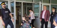 Education Minister Greets Returning Student in Paradise