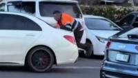 Man clings to ‘getaway’ Mercedes in drama in Melbourne car park