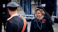 King Haakon reaches for grieving mother Queen Sonja's hand in emotional moment