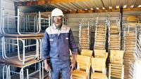 Broken school chairs, desks inspire business