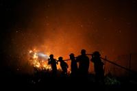 Indonesian wildfires cause respiratory infections to double in a week, health ministry says