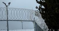 Michigan inmate sues after ID allegedly altered to depict racist stereotypes
