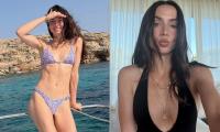 Ana De Armas shows off her toned figure in a lilac floral bikini as she shares her fun-filled summer photo album