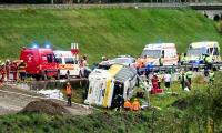 Several dead after tourist coach carrying 48 passengers flips over mountain road in Swiss Alps