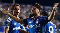 Como ease past Leipzig in dream Champions League debut