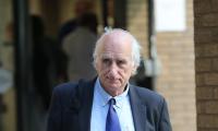 Former Scottish laird who twice ordered a hitman to murder his child's mother is jailed for two years for throttling woman for singing too loudly at We Will Rock You musical