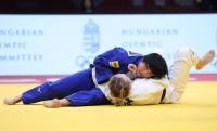 -57 kg: Funakubo’s Groundwork Garners Gold