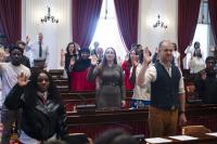 Somber and hopeful, 47 immigrants become U.S. citizens on 9/11 anniversary