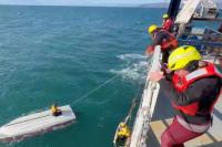 Teenage boy rescued off Alaska days after fishing boat capsized and his brother and cousin died