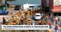 Houghton flag display welcomes Michigan Tech international students ahead of Festival of Nations