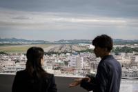 China threat erodes Japanese anger over U.S. bases ahead of vote