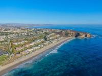 Seven California beachfront homes red-tagged after surf strips sand, batters foundations