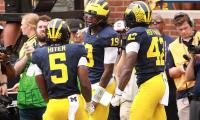 Michigan issues perfect response to controversy and completely flips the script... as college football's most expensive quarterback comes good