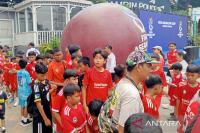 Indonesia stages parade to build enthusiasm for FIFA ASEAN Cup