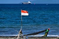 Indonesia rescue 103 passengers aboard Java-Borneo ferry caught in storm, one dead