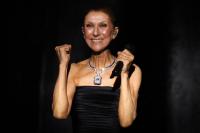 Dion returns to stage in tearful Paris comeback