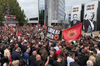 Thousands of Kosovars rally to support Thaci
