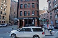 Yemeni Chai Chain MOTW Coffee Plants Flag in Boston’s Financial District