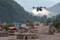 Nepal uses Chinese cargo drones to lift flood victims' bodies, haul food to survivors
