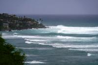 Hurricane Lowell blasts dirt, debris into Kauai hotel as storm forces its way in