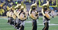 Iowa Band Fights Back Tears in Tribute Performance to Late Bandmate