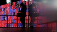 Shares slip in Asia as oil climbs, rate hikes loom