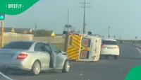 4 men rush to rescue people trapped in overturned Cape Town ambulance: Video sparks debate