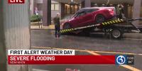 Cars submerged, stalled near New Haven train station as heavy rain triggers flash flooding