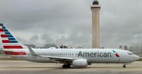 American Airlines passenger accused of undressing, behaving indecently