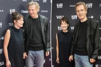 Liam Neeson, 74, holds hands with costar Stella Stocker on Toronto International Film Festival red carpet