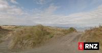 Two people dead, third in hospital after boat capsizes at Manawatū beach