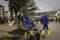 In DR Congo streets, ex-hoods get tough on litter -- and loca