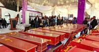 Families of victims of a deadly fire in DR Congo gather at a morgue ahead of mass funeral