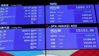 Asian markets tumble as tech leaders call for slower AI development