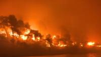 Terrifying moment Brit tourists flee wildfires on little boats in Dunkirk-style evacuation from holiday island inferno