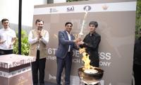 Ceremonial torch handed to Uzbek GM Sindarov by AICF Prez Narang ahead of Chess Olympiad