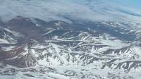 Aerial view of the snow-covered Andes Mountains between Argentina and Chile amazes experts and users