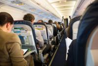 Two men restrained on Qatar flight after threatening to shoot passengers