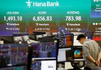 Asian shares waver as oil and yields rise ahead of Fed, BOJ meetings