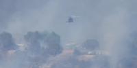 2 injured, evacuations underway as brush fire engulfs homes in Los Angeles County