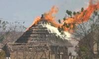 Three killed in Zimbabwe farm attack, bodies set alight in hut