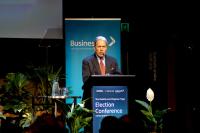 Coalition parties exchange friendly fire in pitches to business crowd