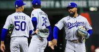Dodgers, with playoff ticket punched, resume business in Cincinnati