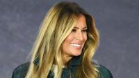 Melania Trump is a vision in forest green leather & matching high heels as she visits North Carolina elementary school
