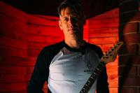 Local company helps send one guitar around the world for music education