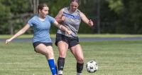 Girls soccer powers gain key momentum