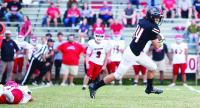 Lebanon holds off Hurricane rally for first win